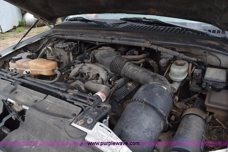 image for item K6073 1999 Ford F450 flatbed truck