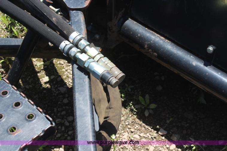 image for item K6998 2006 Caterpillar BA18 skid steer broom