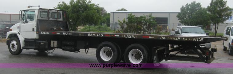 image for item K8688 1997 Freightliner FL80 rollback truck