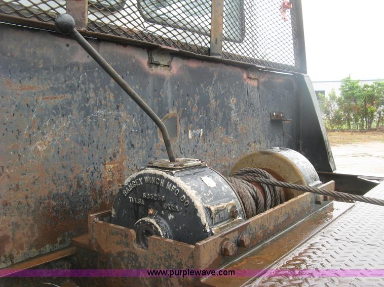 image for item K8688 1997 Freightliner FL80 rollback truck
