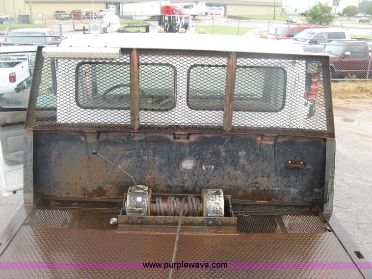 image for item K8688 1997 Freightliner FL80 rollback truck