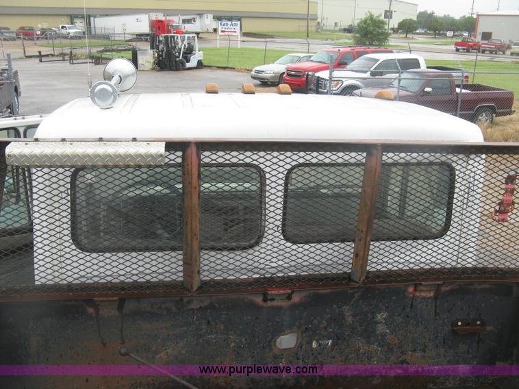 image for item K8688 1997 Freightliner FL80 rollback truck