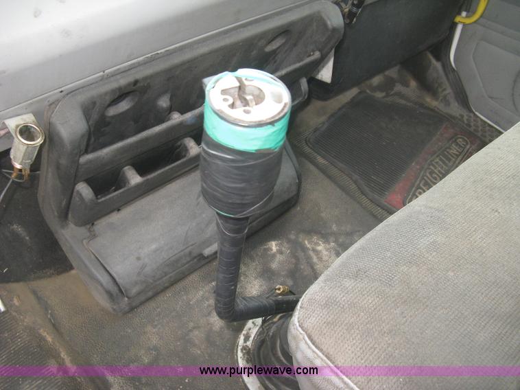 image for item K8688 1997 Freightliner FL80 rollback truck