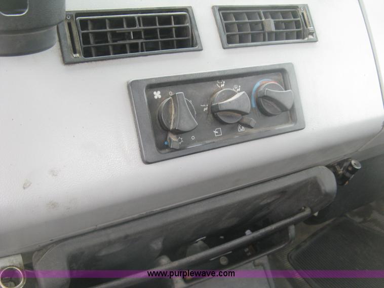image for item K8688 1997 Freightliner FL80 rollback truck