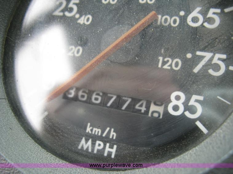 image for item K8688 1997 Freightliner FL80 rollback truck
