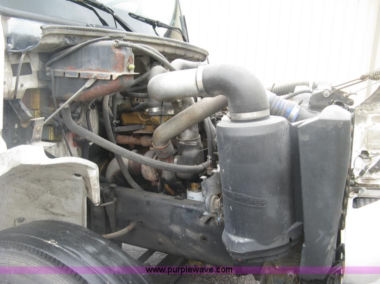 image for item K8688 1997 Freightliner FL80 rollback truck