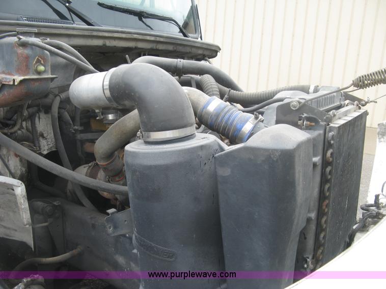 image for item K8688 1997 Freightliner FL80 rollback truck