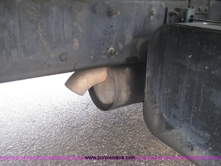 image for item K8688 1997 Freightliner FL80 rollback truck