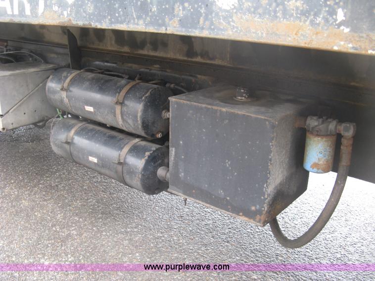 image for item K8688 1997 Freightliner FL80 rollback truck