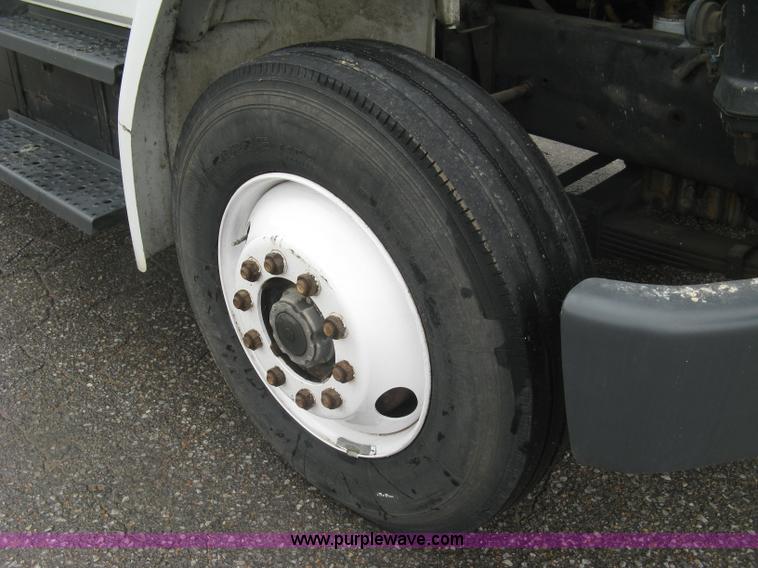 image for item K8688 1997 Freightliner FL80 rollback truck