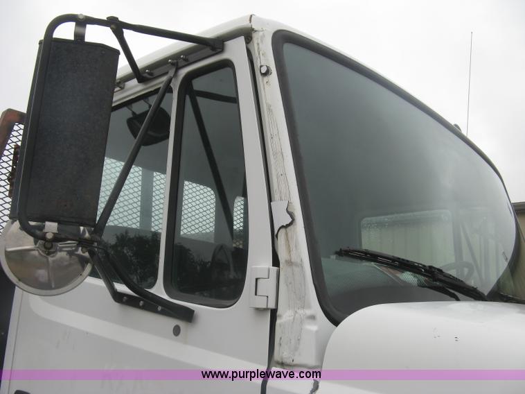 image for item K8688 1997 Freightliner FL80 rollback truck