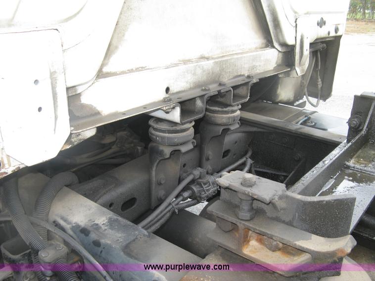 image for item K8688 1997 Freightliner FL80 rollback truck