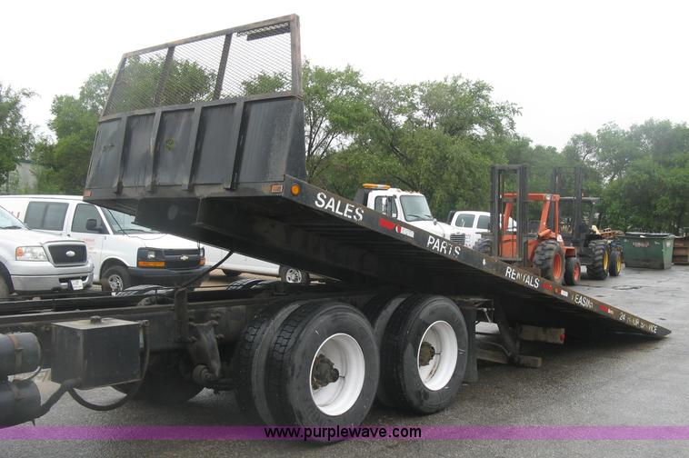 image for item K8688 1997 Freightliner FL80 rollback truck