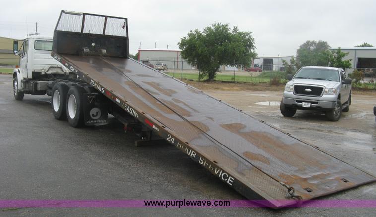 image for item K8688 1997 Freightliner FL80 rollback truck