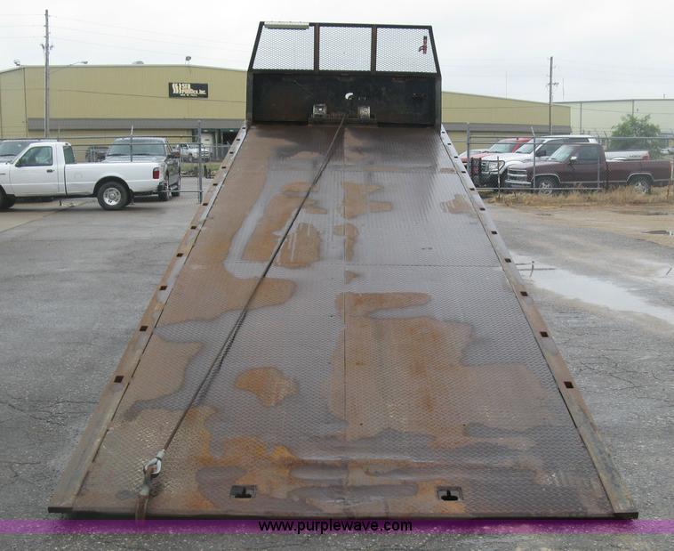 image for item K8688 1997 Freightliner FL80 rollback truck
