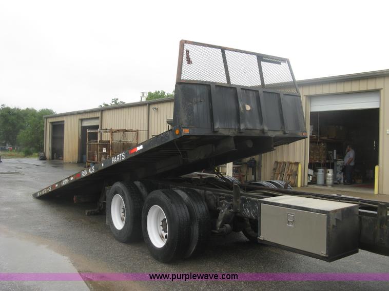 image for item K8688 1997 Freightliner FL80 rollback truck