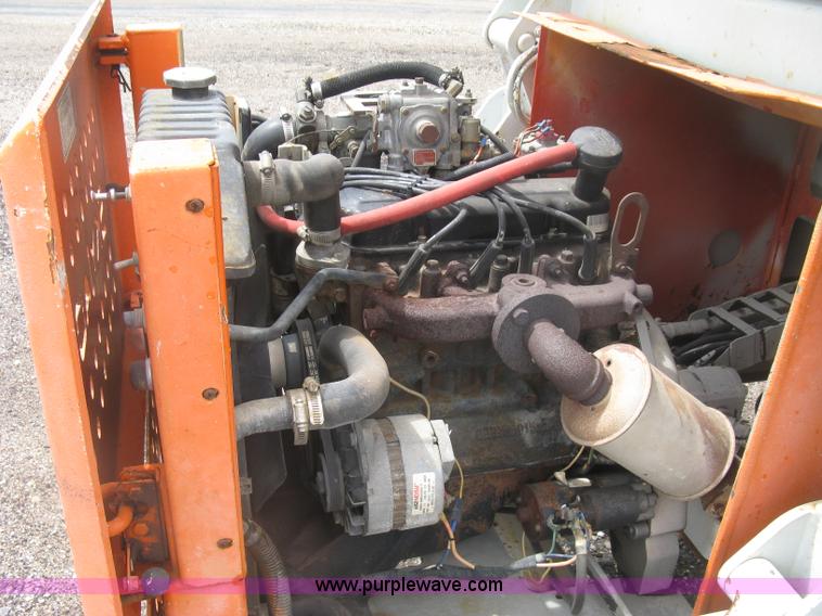 image for item K8689 1999 Sky Jack SJ8841A scissor lift