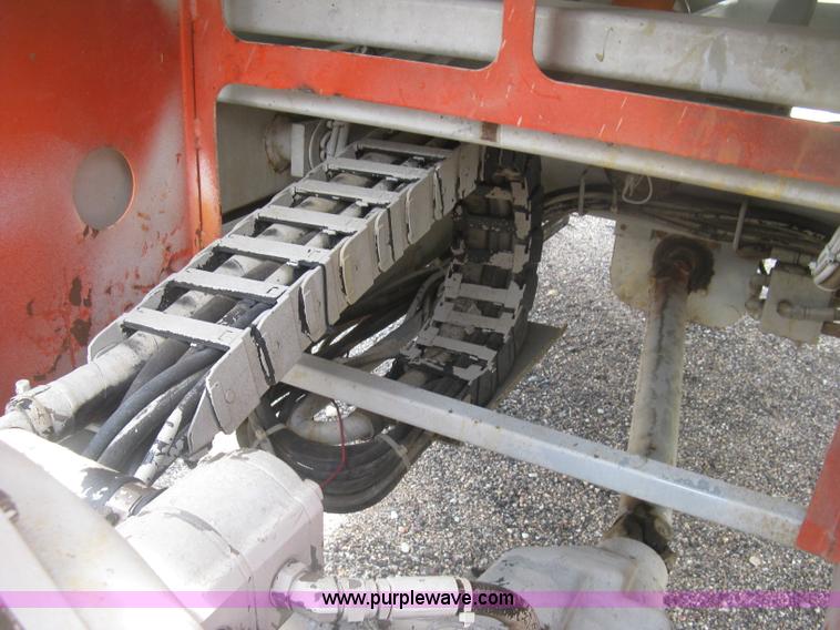 image for item K8689 1999 Sky Jack SJ8841A scissor lift