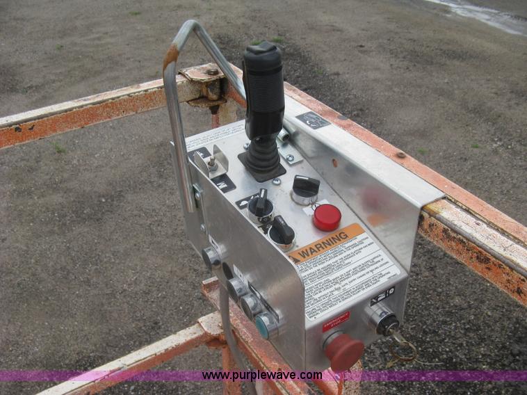 image for item K8689 1999 Sky Jack SJ8841A scissor lift