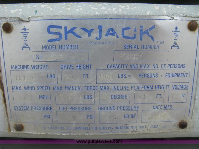 image for item K8689 1999 Sky Jack SJ8841A scissor lift