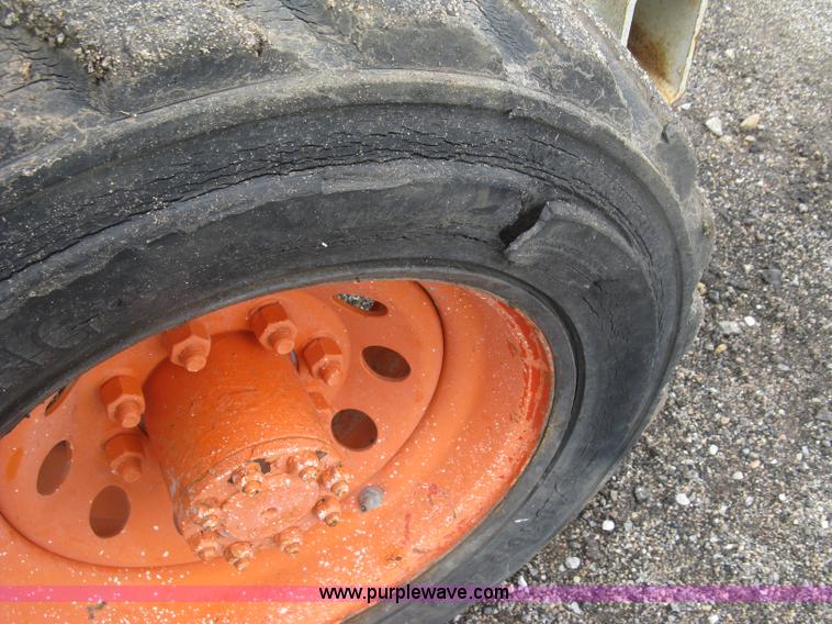 image for item K8689 1999 Sky Jack SJ8841A scissor lift