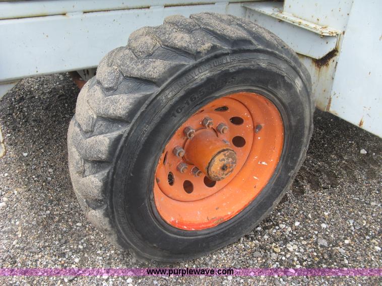 image for item K8689 1999 Sky Jack SJ8841A scissor lift