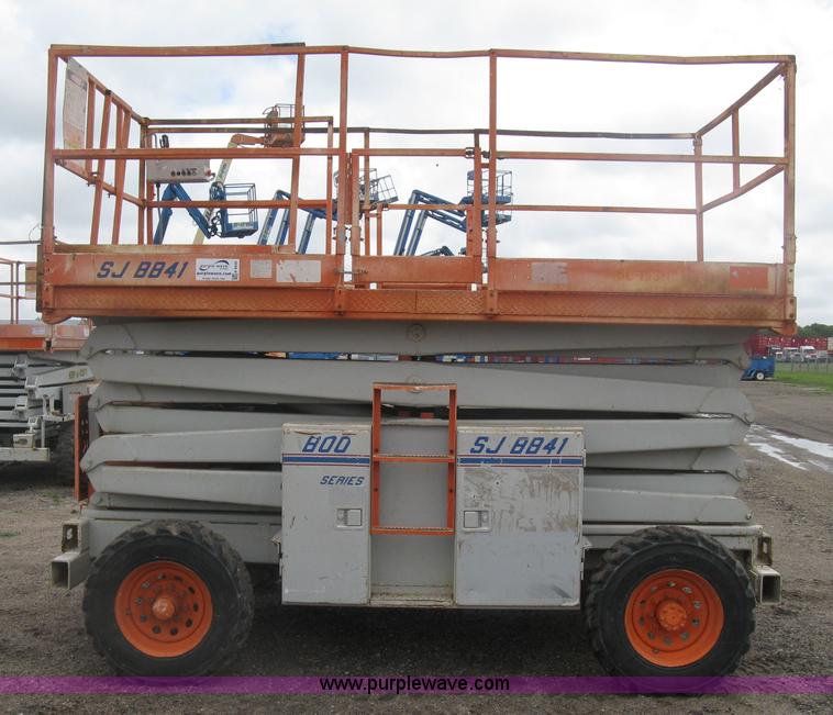 image for item K8690 1999 Sky Jack SJ8841A scissor lift