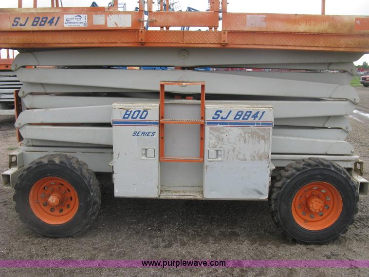 image for item K8690 1999 Sky Jack SJ8841A scissor lift
