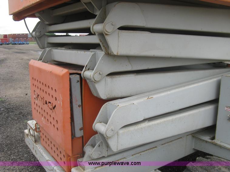 image for item K8690 1999 Sky Jack SJ8841A scissor lift
