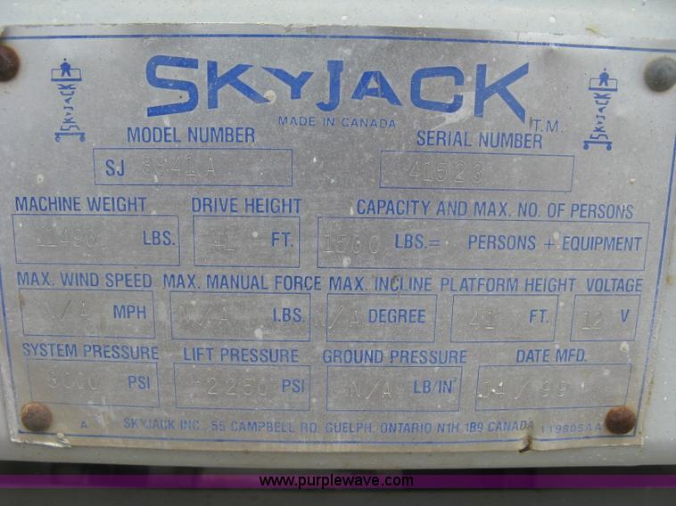 image for item K8690 1999 Sky Jack SJ8841A scissor lift