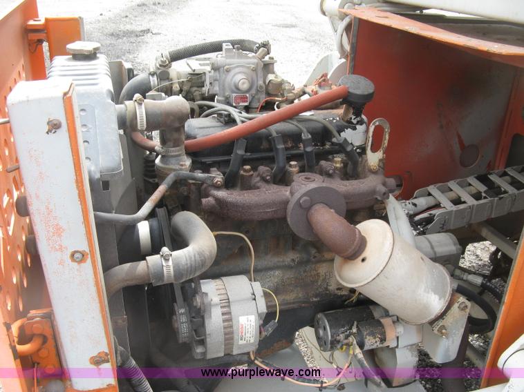 image for item K8690 1999 Sky Jack SJ8841A scissor lift