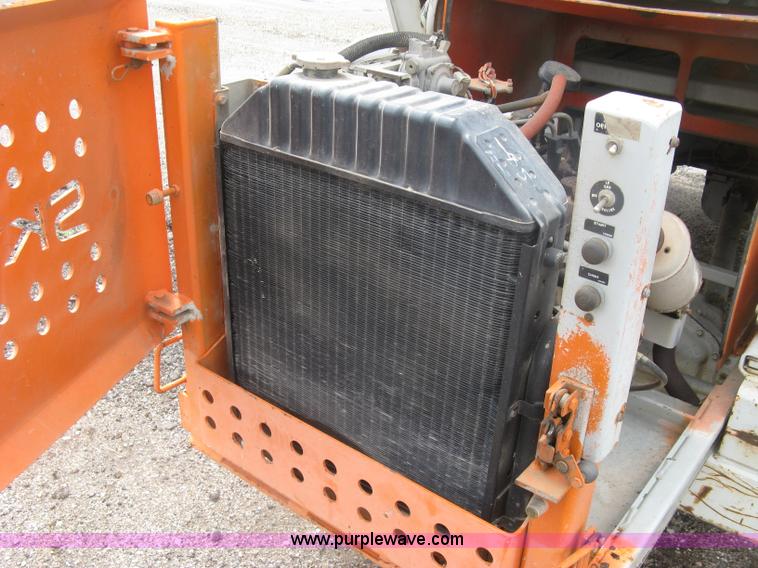 image for item K8690 1999 Sky Jack SJ8841A scissor lift