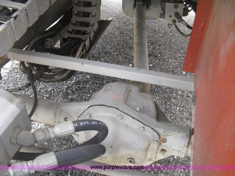 image for item K8690 1999 Sky Jack SJ8841A scissor lift