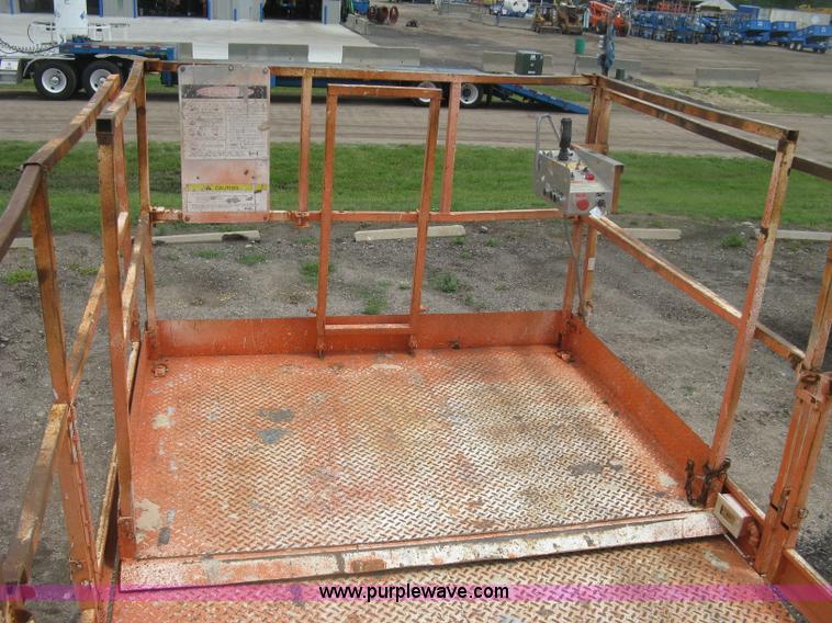 image for item K8690 1999 Sky Jack SJ8841A scissor lift