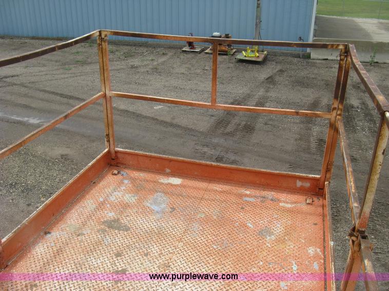 image for item K8690 1999 Sky Jack SJ8841A scissor lift