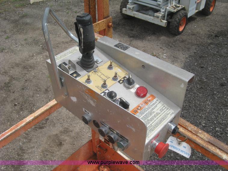 image for item K8690 1999 Sky Jack SJ8841A scissor lift