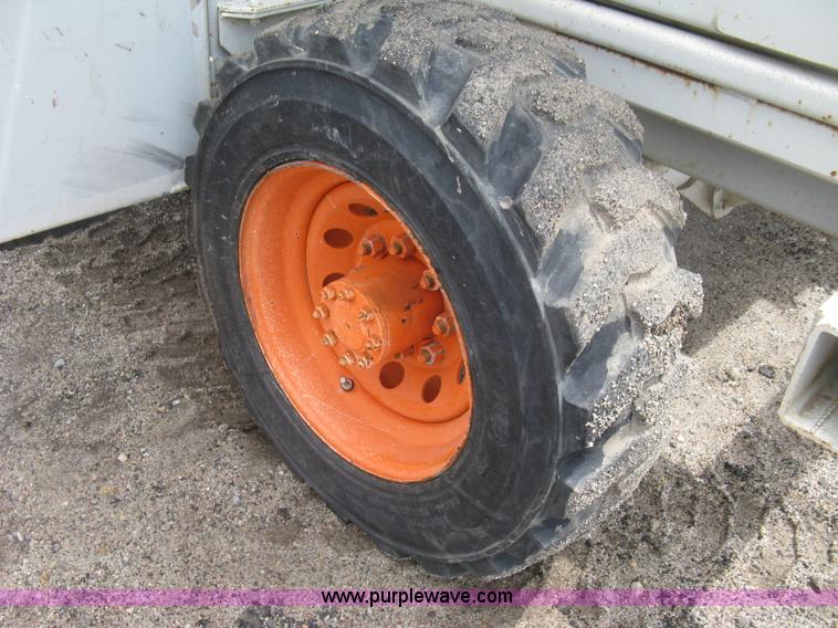 image for item K8690 1999 Sky Jack SJ8841A scissor lift