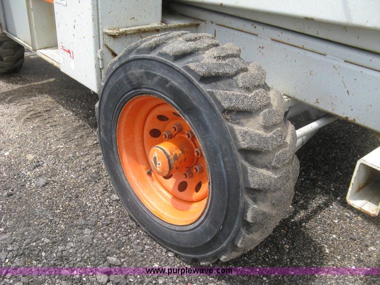 image for item K8690 1999 Sky Jack SJ8841A scissor lift