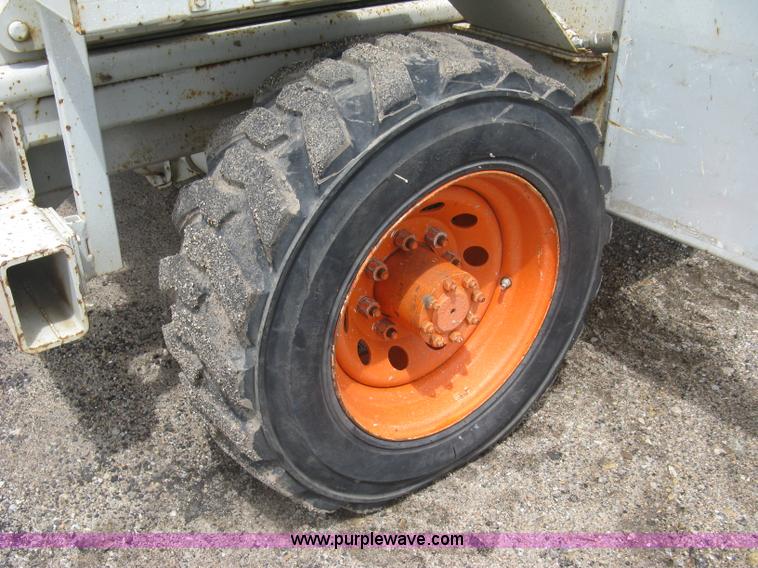 image for item K8690 1999 Sky Jack SJ8841A scissor lift