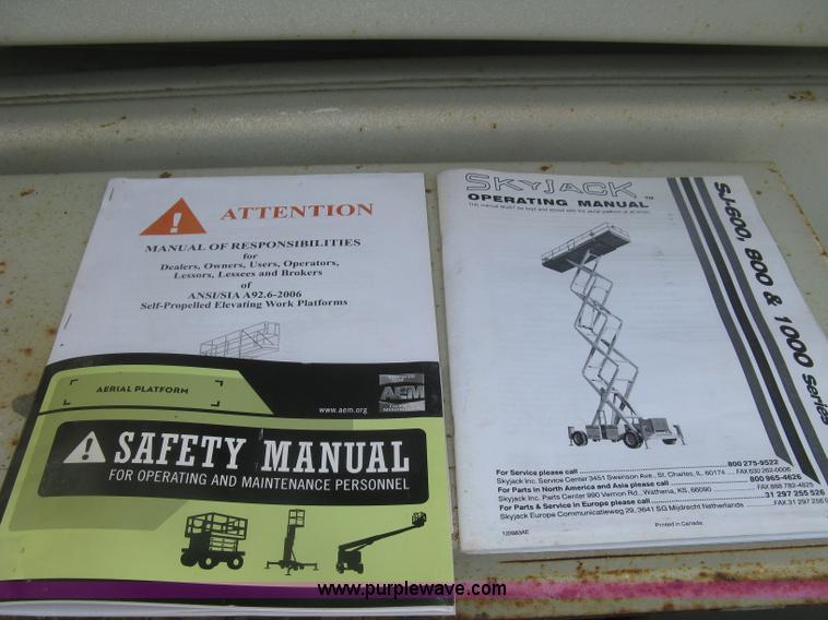 image for item K8690 1999 Sky Jack SJ8841A scissor lift