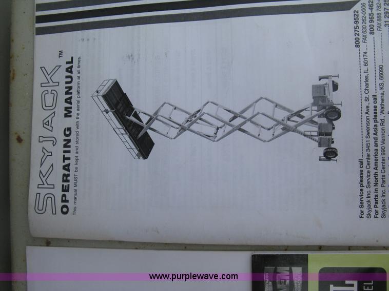 image for item K8690 1999 Sky Jack SJ8841A scissor lift