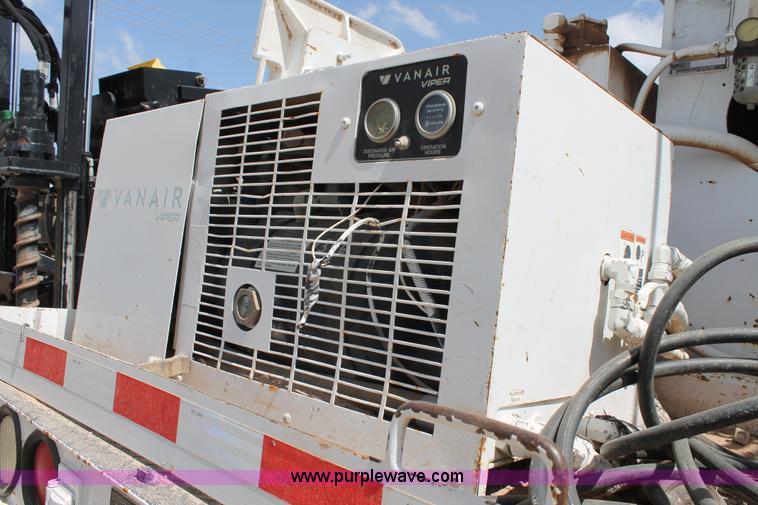 image for item L4264 2000 Chevrolet C8500 digger derrick truck