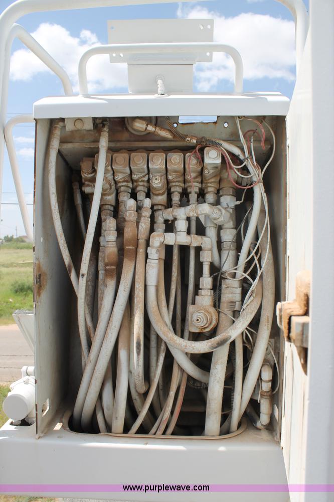 image for item L4264 2000 Chevrolet C8500 digger derrick truck