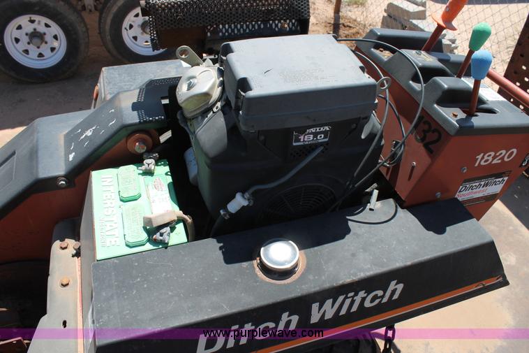 image for item L4279 2004 Ditch Witch 1820HE trencher and trailer