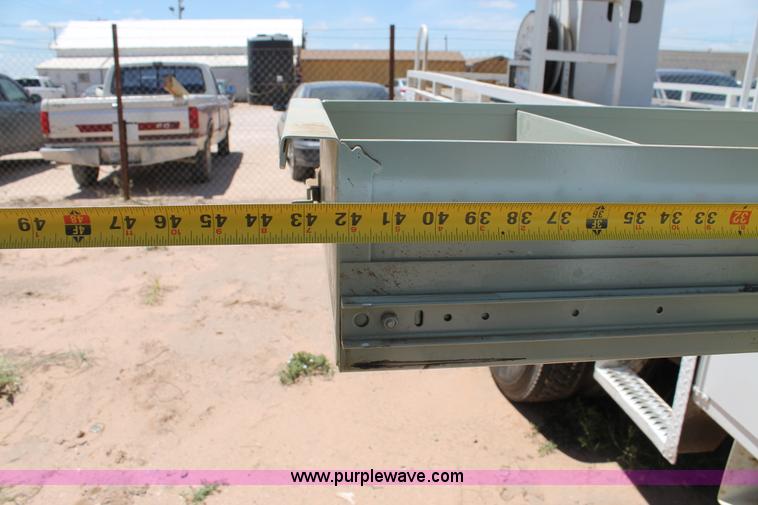 image for item L4284 1999 International 4900 digger derrick truck