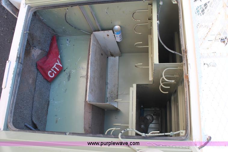 image for item L4284 1999 International 4900 digger derrick truck