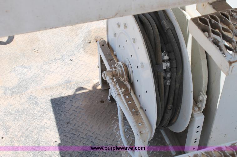 image for item L4284 1999 International 4900 digger derrick truck