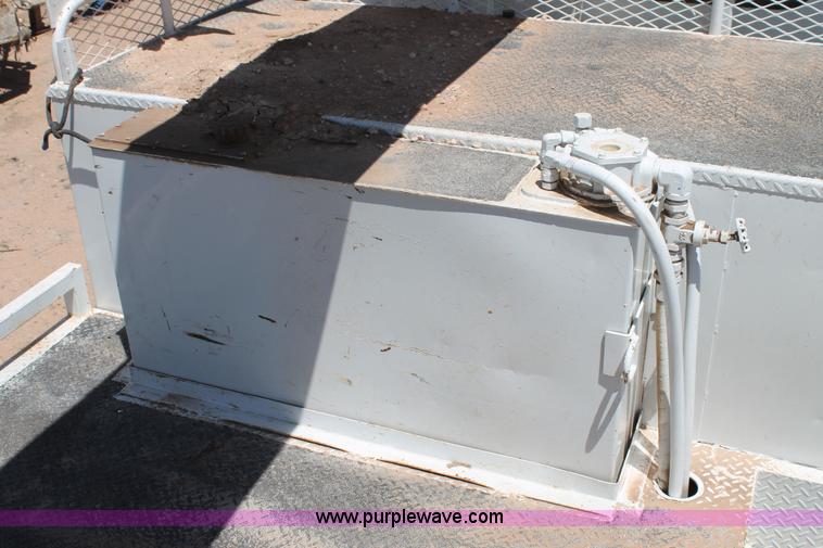 image for item L4284 1999 International 4900 digger derrick truck