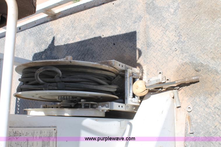 image for item L4284 1999 International 4900 digger derrick truck