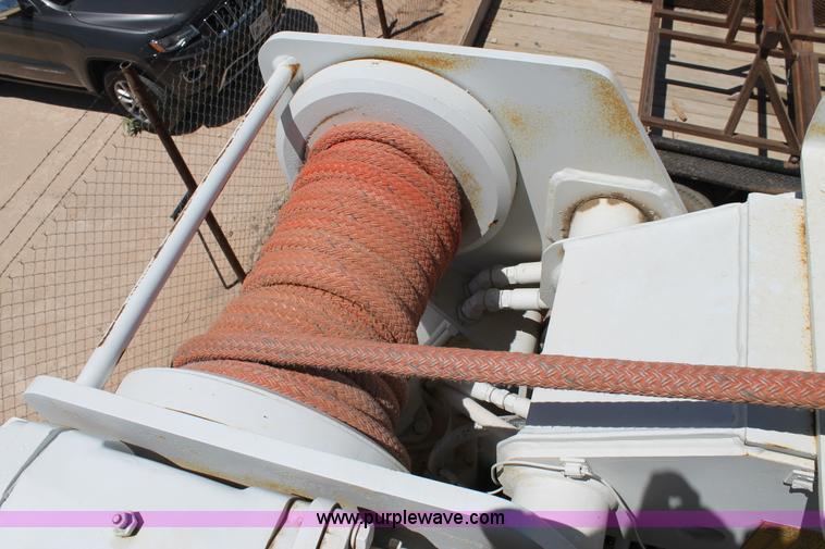 image for item L4284 1999 International 4900 digger derrick truck